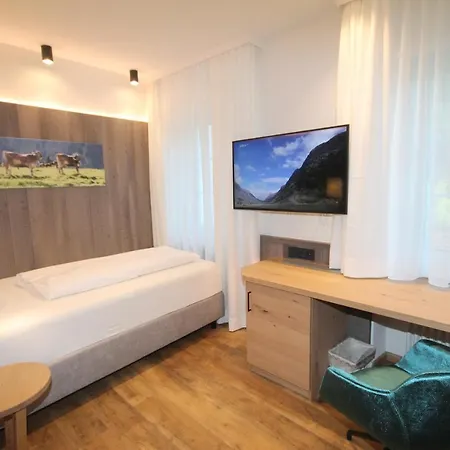 Отель Wohlfuehlhotel Bercher 4*